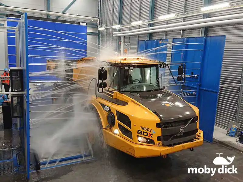 yellow truck being cleaned - wash bays australia